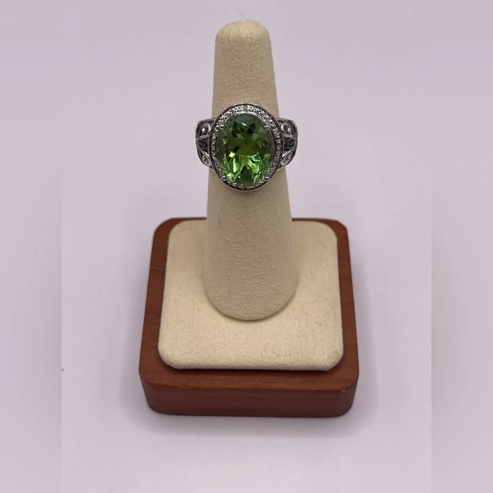 Simulated peridot in sterling silver with black rhinestone accents